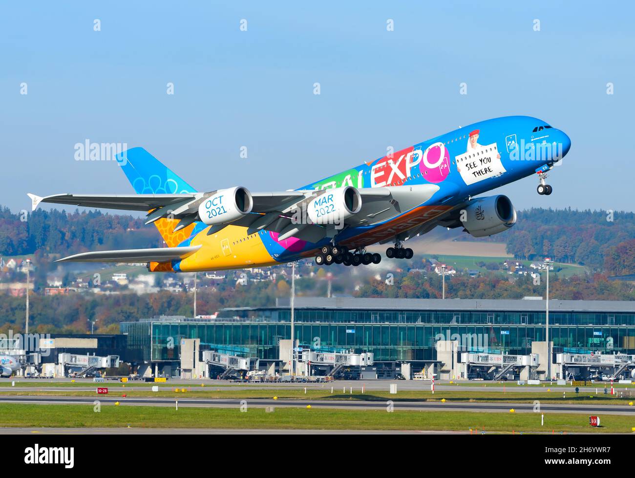 Emirates Airline Expo 2020 special livery Airbus A380 airplane taking off. Aircraft A380-800 featuring a colourful livery Blue Expo. Stock Photo