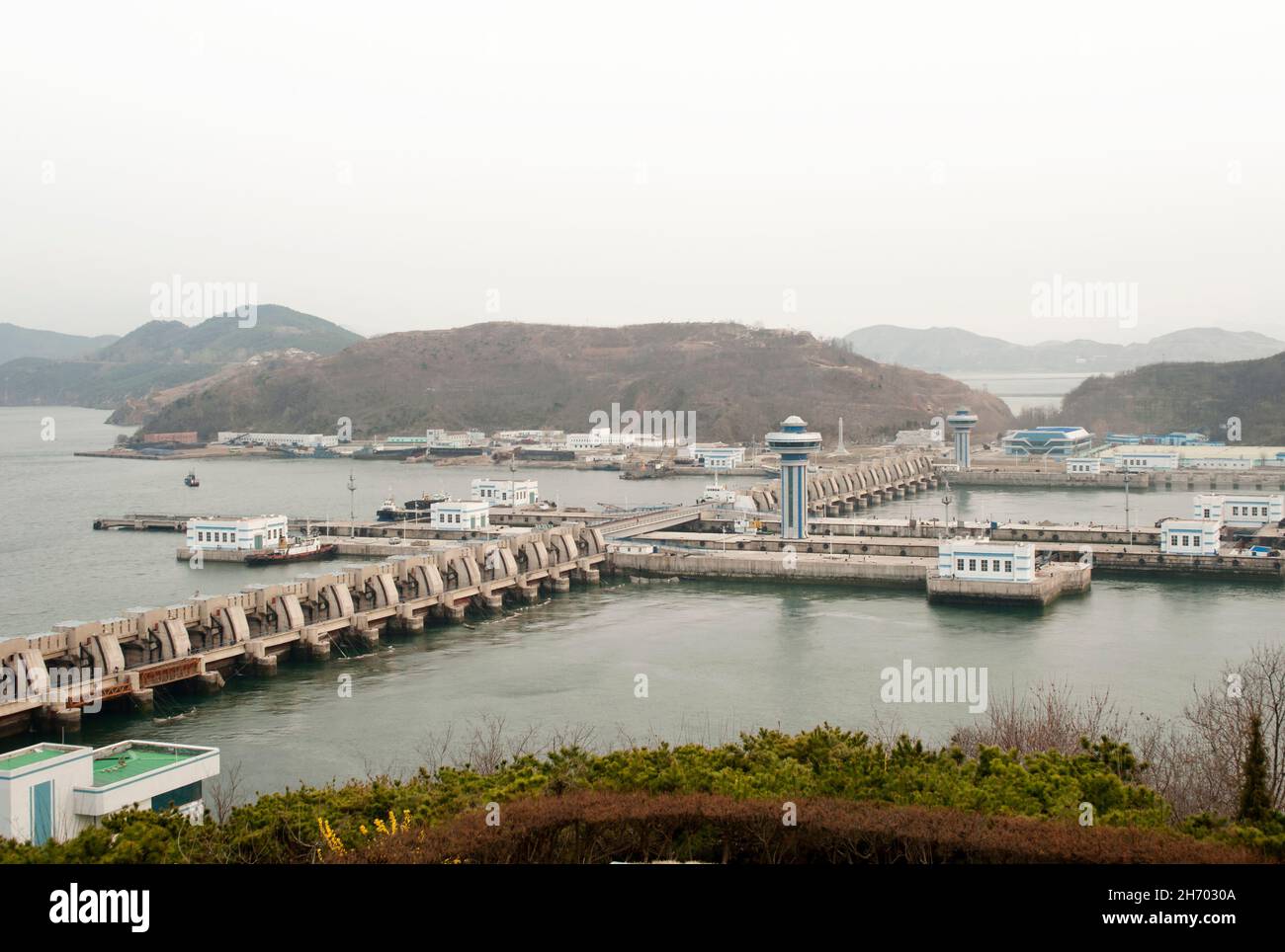 A view of the Nampo Dam, also known as the West Sea Barrage, near the city of Nampo in North Korea. Stock Photo