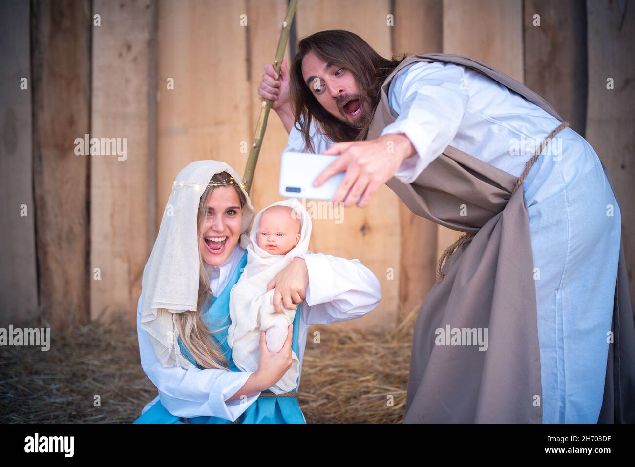 Biblical characters taking selfie while laughing and joking. Nativity scene Stock Photo