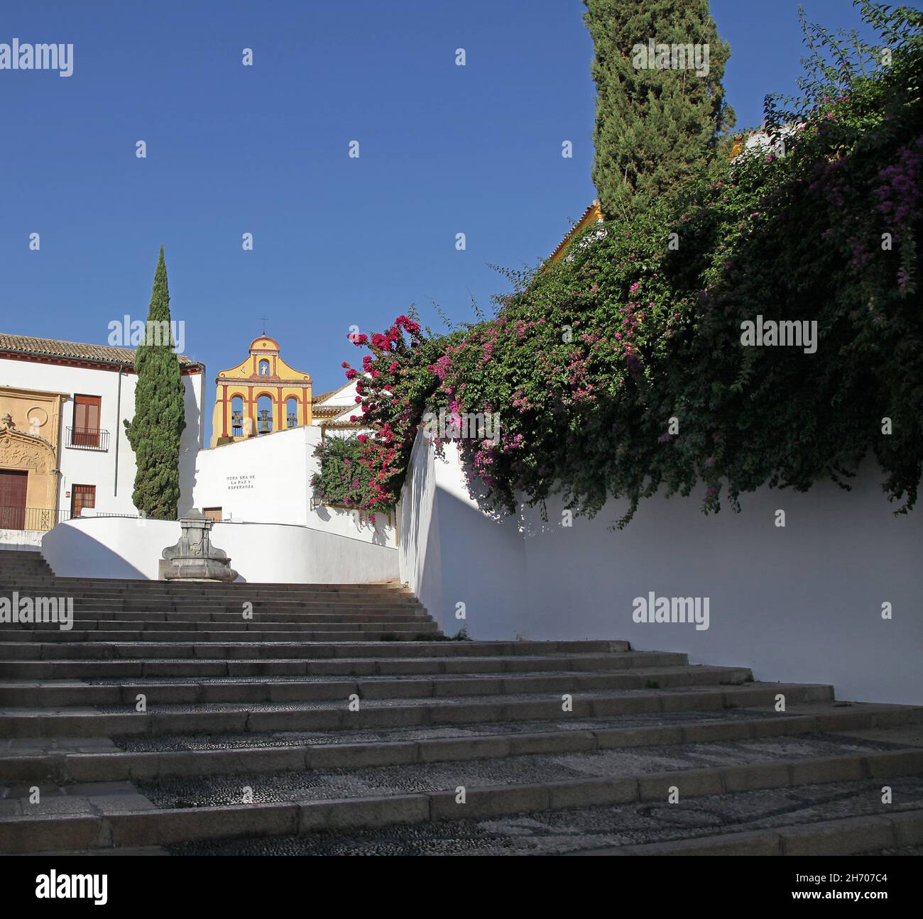 Plaza Nuestra Señora de la Paz y Esperanza in Córdoba Spain.Square next to the Christ of the Lanterns,full of flowers and steps that lead to the Bailio slope. Stock Photo