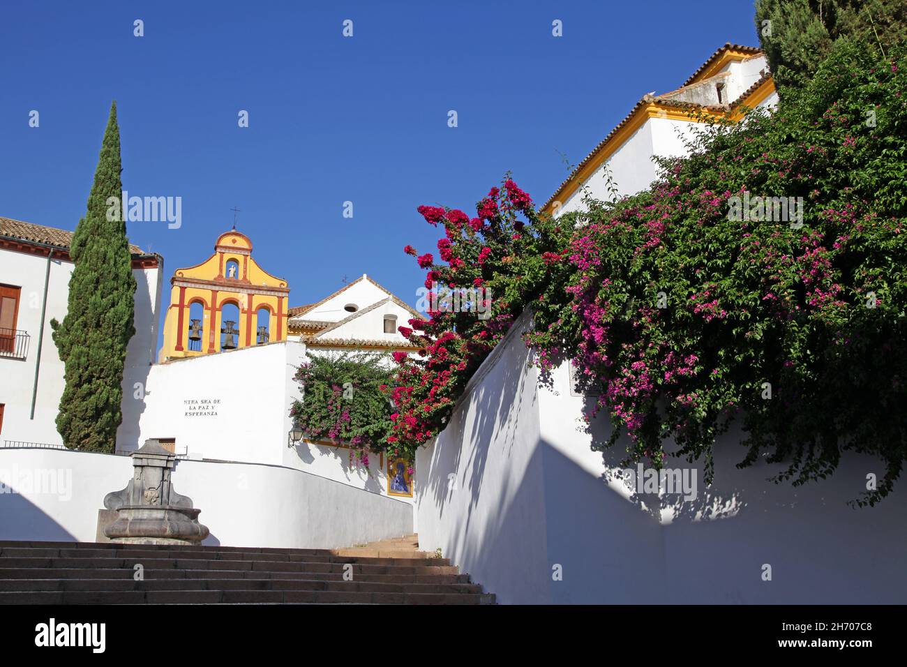 Plaza Nuestra Señora de la Paz y Esperanza in Córdoba Spain.Square next to the Christ of the Lanterns,full of flowers and steps that lead to the Bailio slope. Stock Photo
