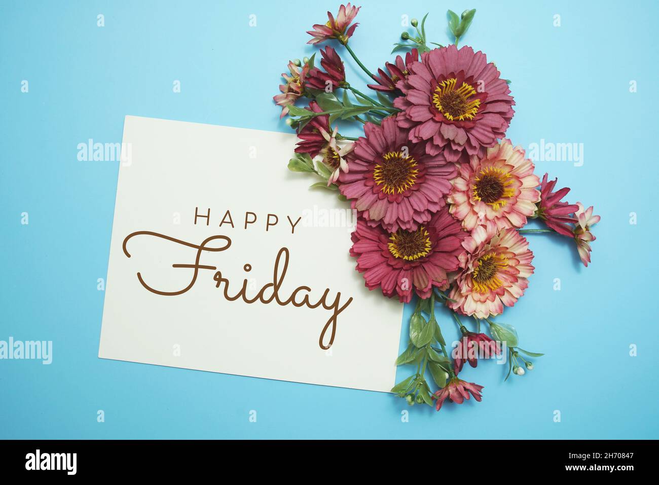 Happy Friday card typography text with flower bouquet on blue background Stock Photo