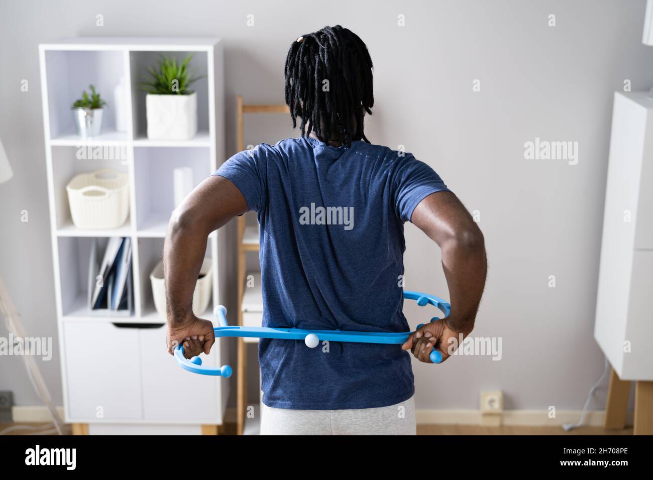 Man Using Muscle Hook For Trigger Point Massage Stock Photo Alamy