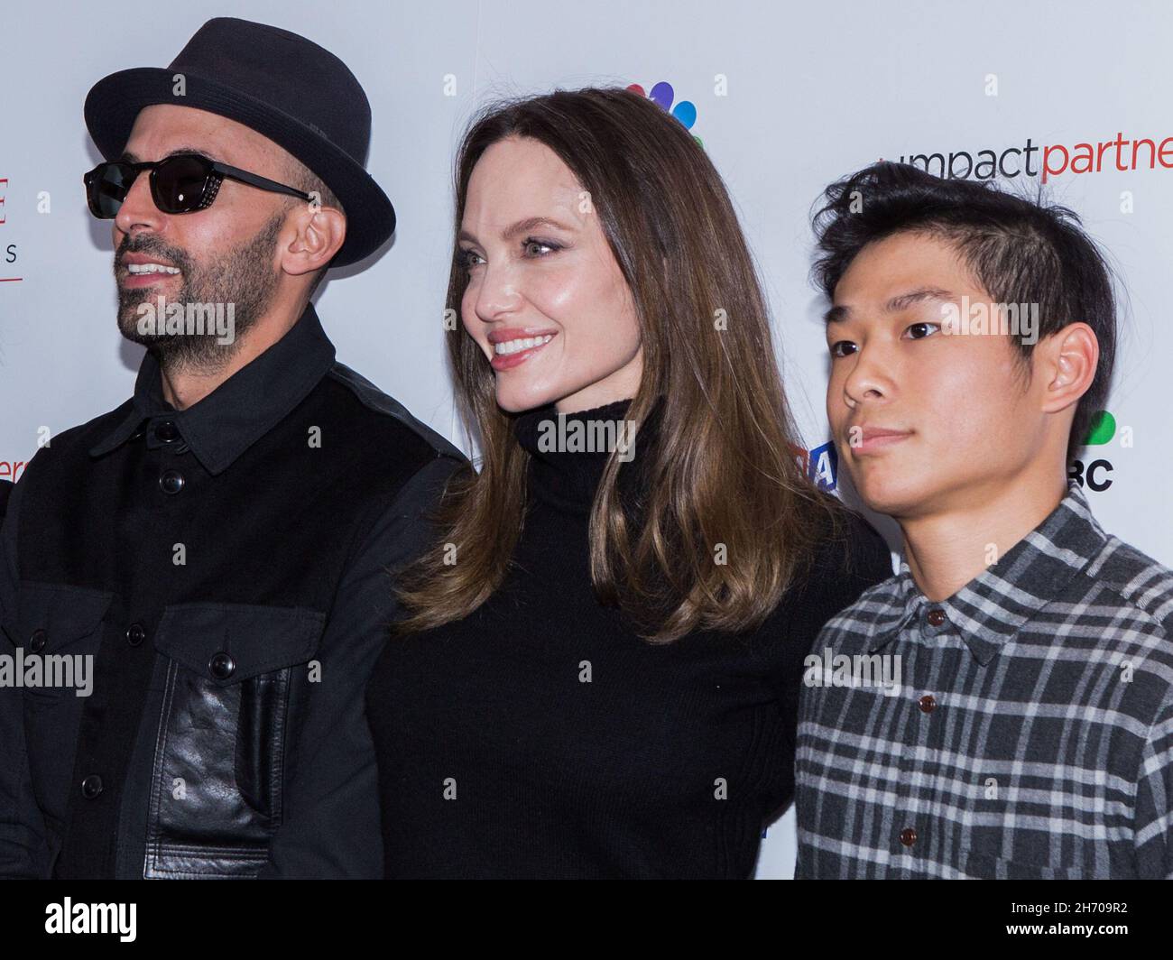 Los Angeles, United States. 18th Nov, 2021. LOS ANGELES, CALIFORNIA, USA - NOVEMBER 18: Street artist JR, actress Angelina Jolie and Pax Thien Jolie-Pitt arrive at the Los Angeles Premiere Of MSNBC Films' 'Paper & Glue: A JR Project' held at the Museum Of Tolerance on November 18, 2021 in Los Angeles, California, United States. (Photo by Rudy Torres/Image Press Agency) Credit: Image Press Agency/Alamy Live News Stock Photo