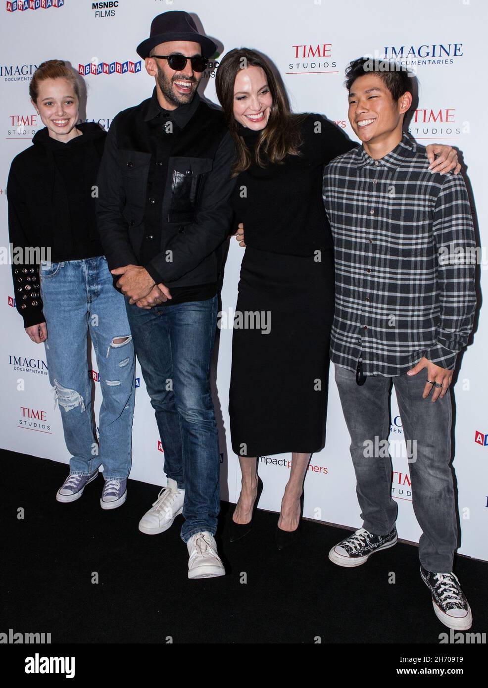 Los Angeles, United States. 18th Nov, 2021. LOS ANGELES, CALIFORNIA, USA - NOVEMBER 18: Shiloh Jolie-Pitt, street artist JR, actress Angelina Jolie and Pax Thien Jolie-Pitt arrive at the Los Angeles Premiere Of MSNBC Films' 'Paper & Glue: A JR Project' held at the Museum Of Tolerance on November 18, 2021 in Los Angeles, California, United States. (Photo by Rudy Torres/Image Press Agency) Credit: Image Press Agency/Alamy Live News Stock Photo