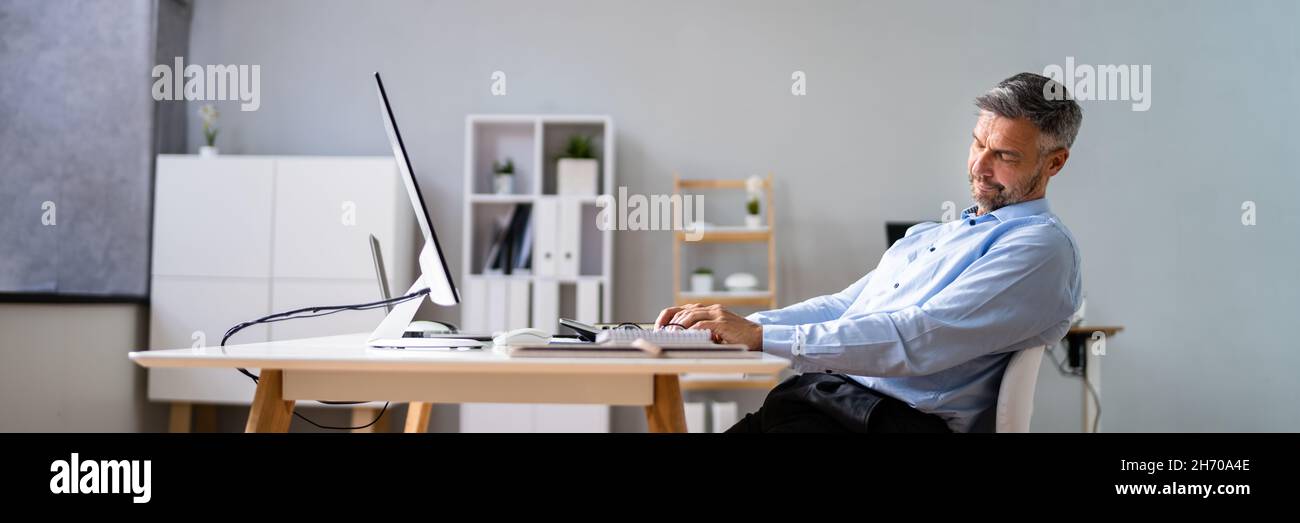 Businessman resting sleeping in chair hi-res stock photography and