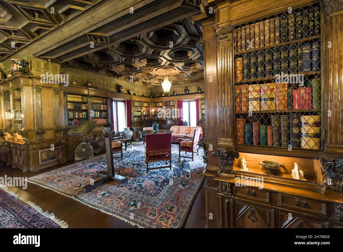 California, USA, 09 Jun 2013: Study room with book shelves at Hearst Castle, which is a National and California Historical Landmark opened for public Stock Photo