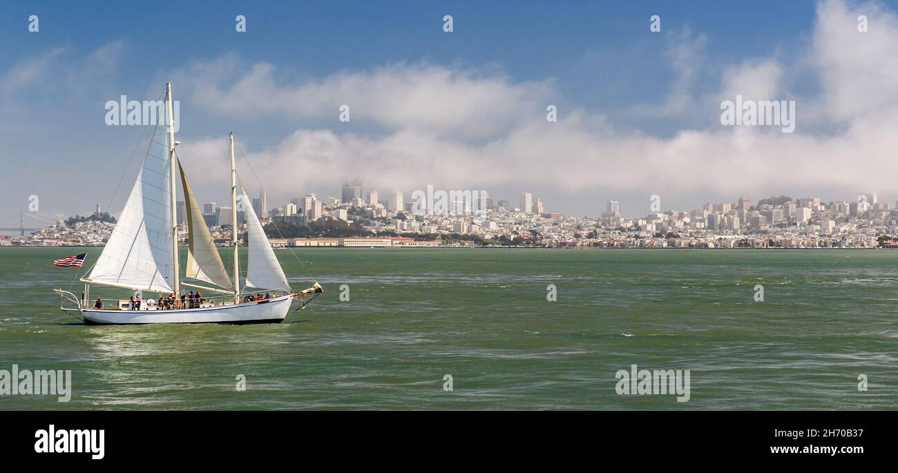 San Francisco, USA, 28 May 2013: Yacht sailing in seas of metropolitan city. Stock Photo