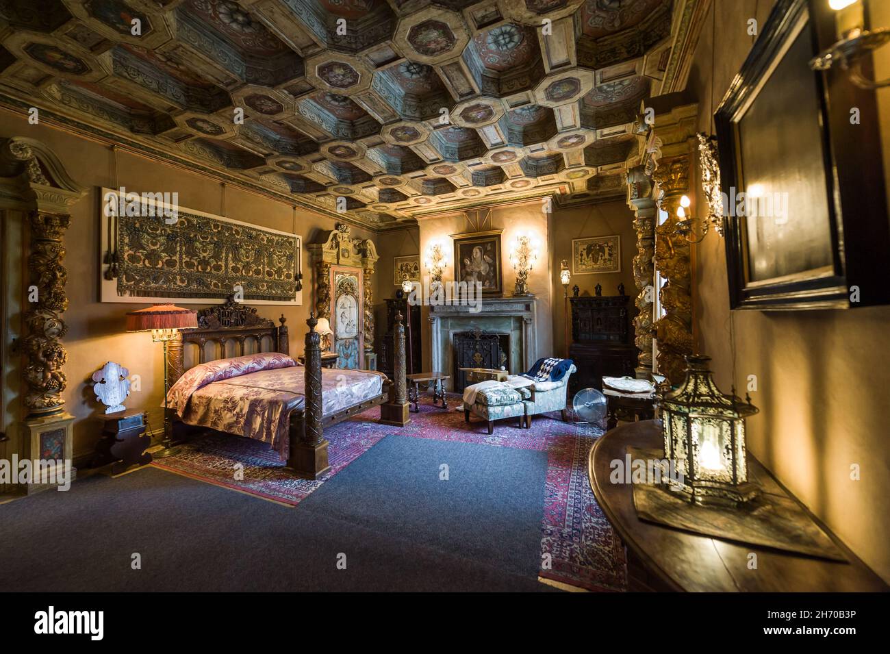 California, USA, 09 Jun 2013: Beautiful and luxurious bedroom with inctricate carvings and designs at Hearst Castle, which is a National and Californi Stock Photo