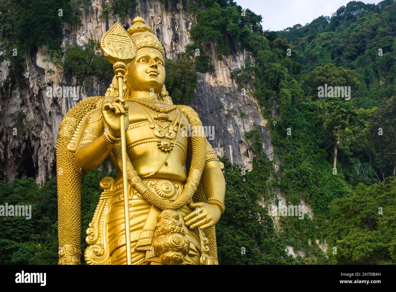 Selangor, Malaysia, 09 Aug 2015: Statue of Hindu God  of war and victory Murugan at entrance to Batu Caves. Stock Photo