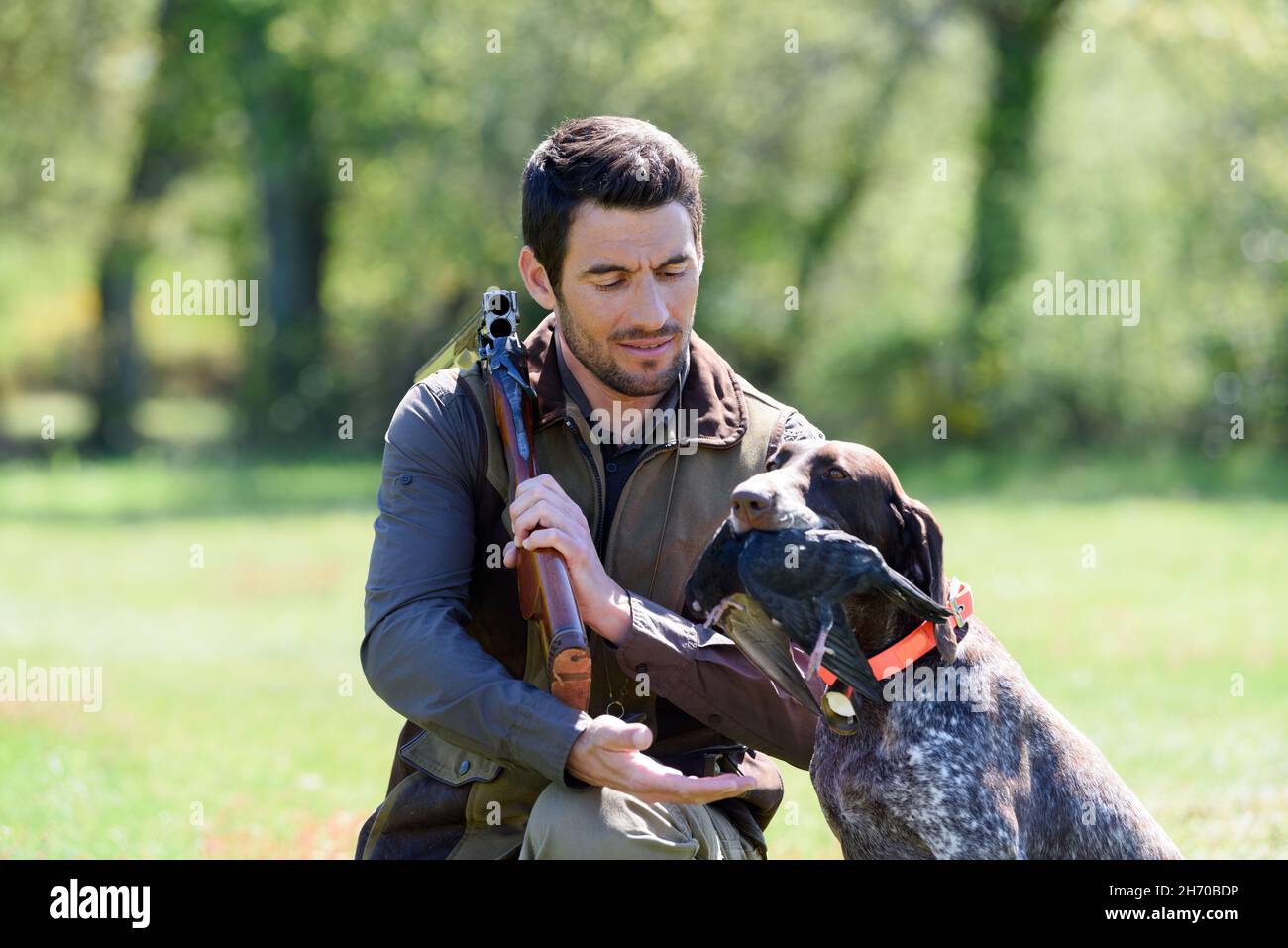 hunter with a dog at hunt Stock Photo