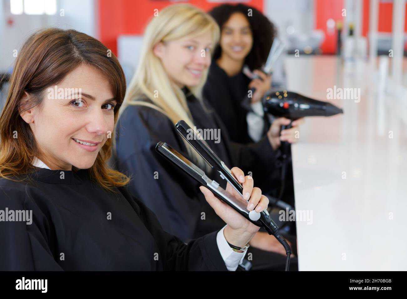 they are training to hairdressers Stock Photo Alamy