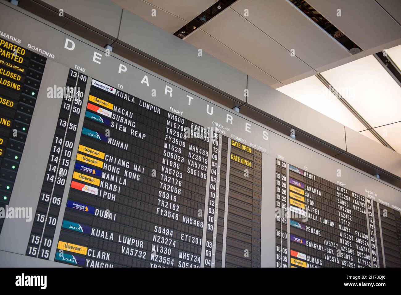 Singapore, 11 Feb 2016: Huge display for flight information for departures at Changi Airport, Singapore. Stock Photo