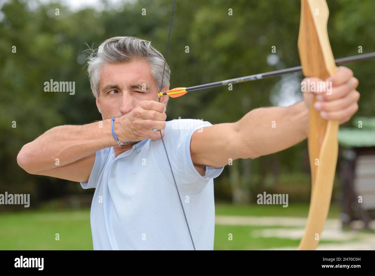 a man practicing the archery Stock Photo