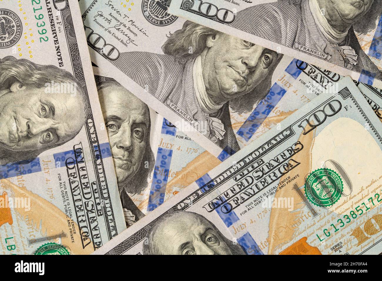 100 US dollars in a pile that fills the entire screen Stock Photo