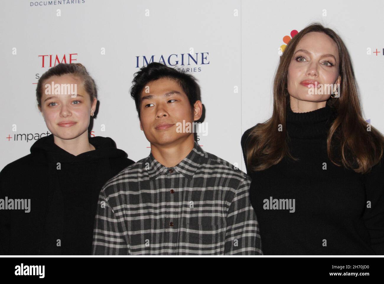 Los Angeles, USA. 18th Nov, 2021. Shiloh Jolie-Pitt, Angelina Jolie, Pax Thien Jolie-Pitt 11/18/2021 The Los Angeles Premiere of 'Paper & Glue' held at the Museum of Tolerance in Los Angeles, CA Credit: Cronos/Alamy Live News Stock Photo