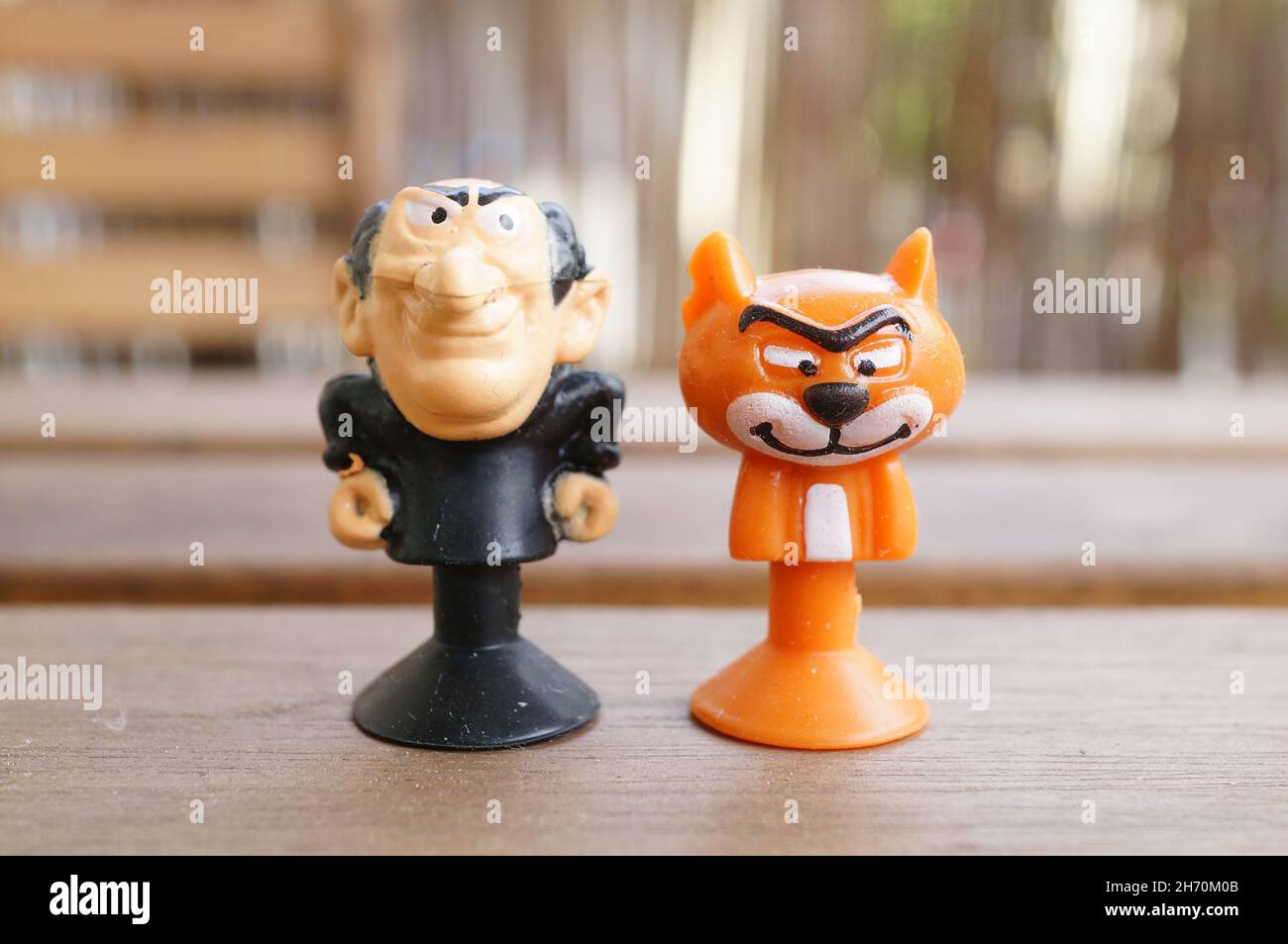 POZNAN, POLAND - May 14, 2017: A closeup shot of Gargamel and Asrael cat toy figurines from the Smurfs movie Stock Photo