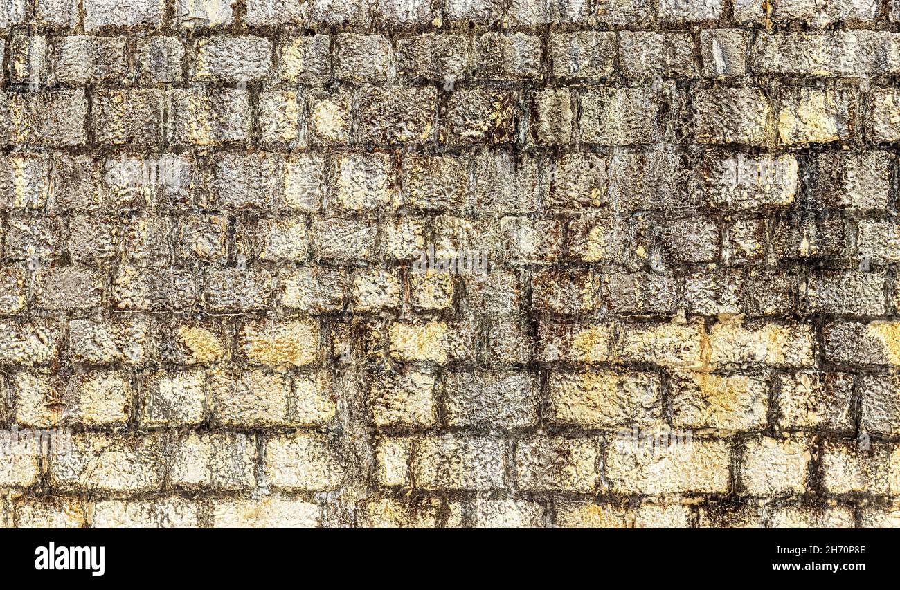 Texture of an old antique stone wall Stock Photo - Alamy