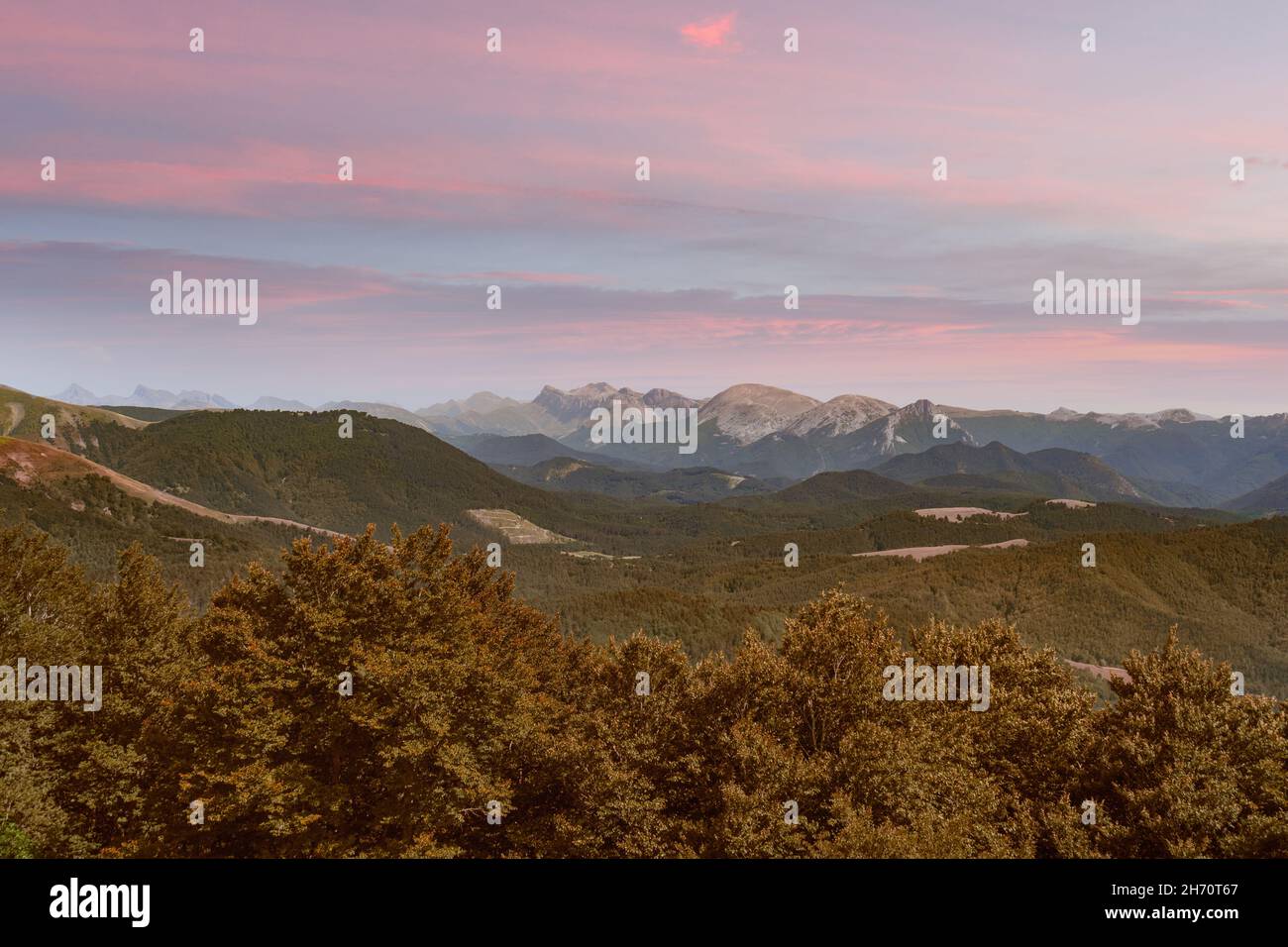 Amazing mountains landscape at sunset.Travel background.Mount Larrau in Pyrenees,near Irati forest between Spain France border. Stock Photo