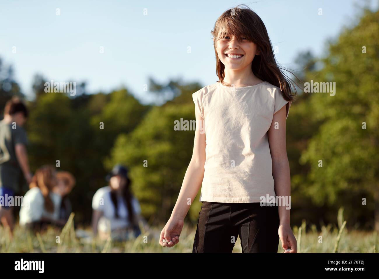 Smiling girl looking at camera Stock Photo