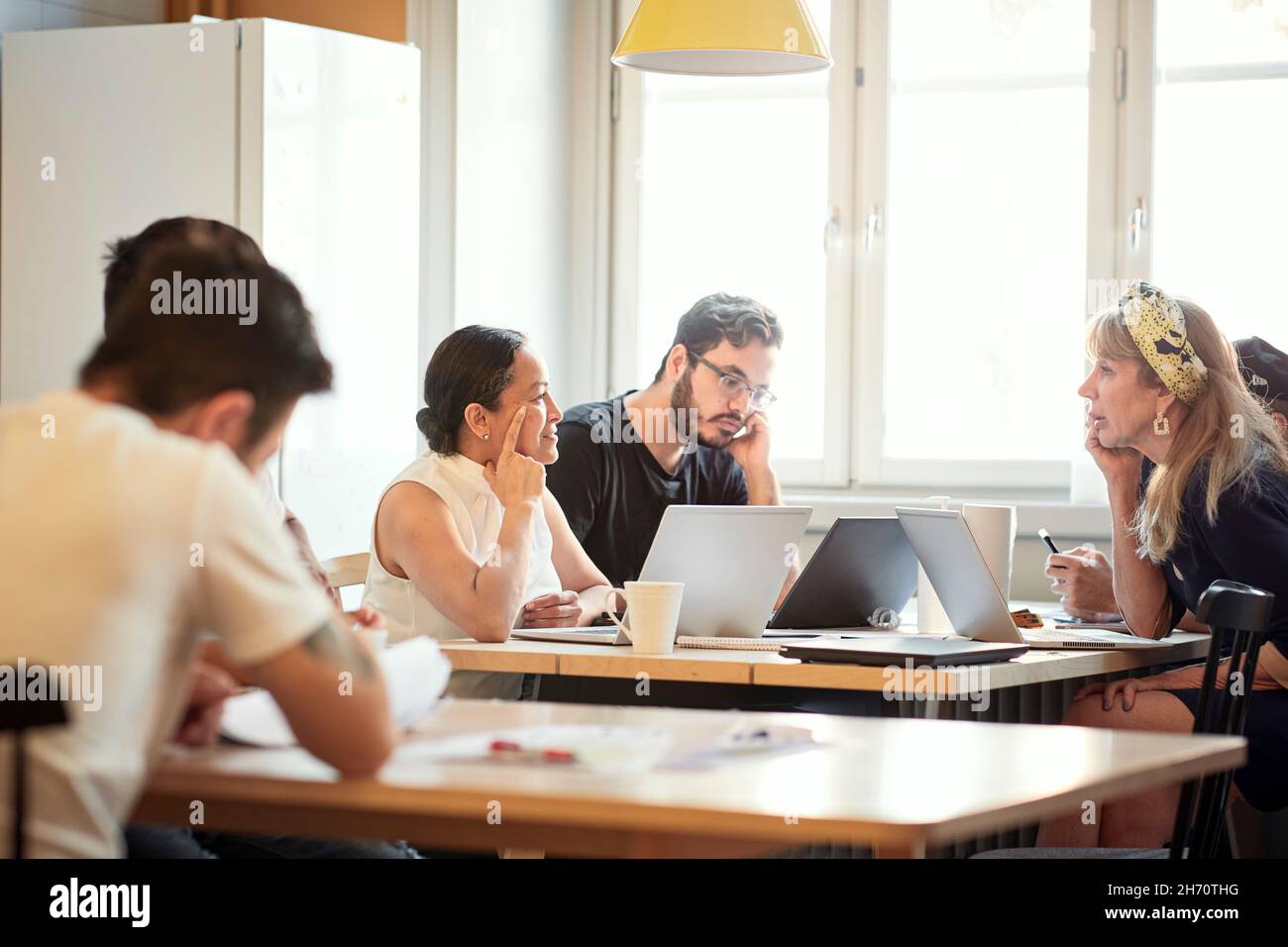 People using laptops Stock Photo - Alamy