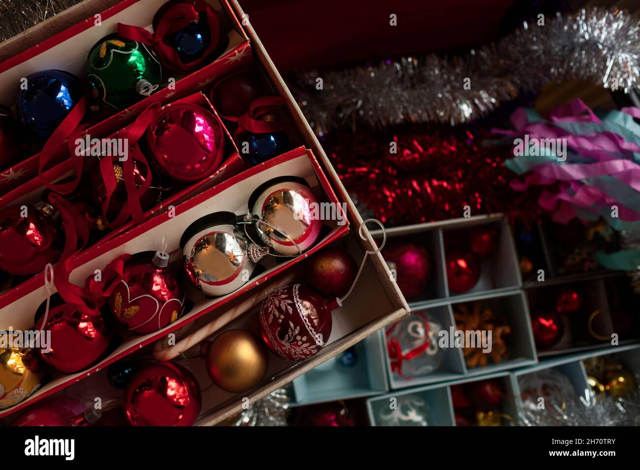 Christmas baubles in boxes Stock Photo