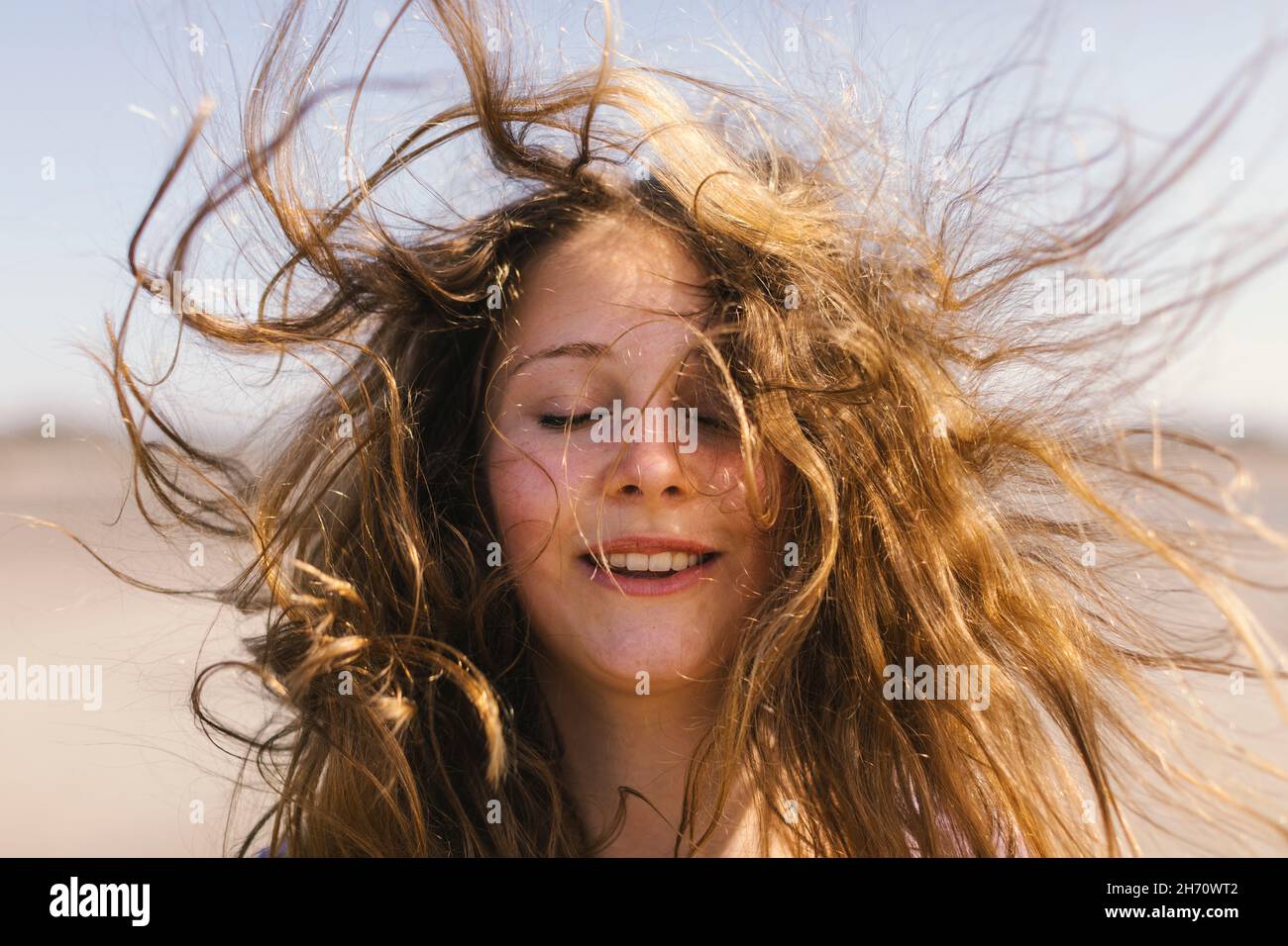 Portrait of teenage girl with messy hair Stock Photo