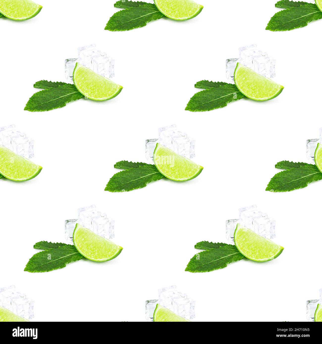 Green limes and lime slices repeat seamless pattern on white background. Stock Photo