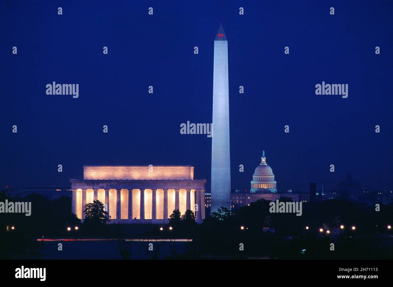 USA. Washington DC. The Washington Monument and Lincoln Memorial at night. Stock Photo