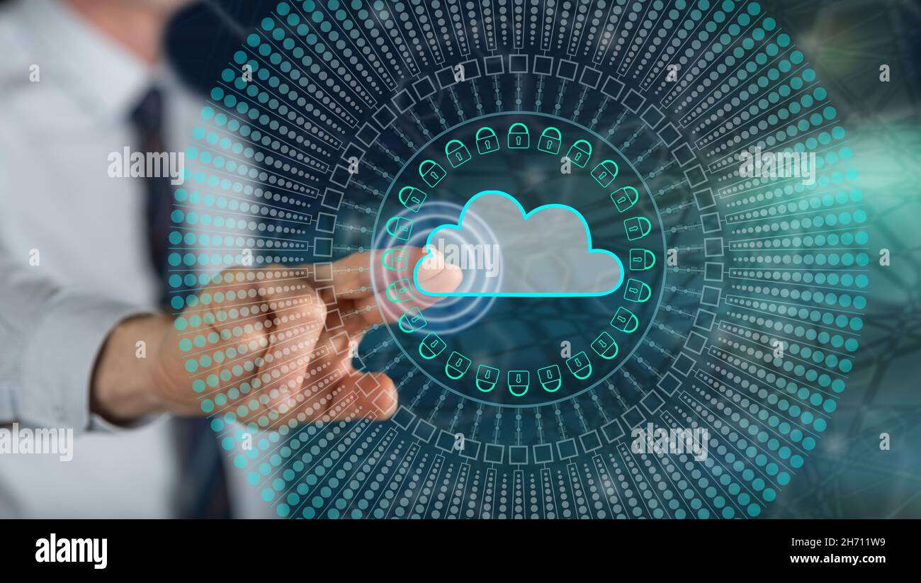 Man touching a cloud networking concept on a touch screen with his ...