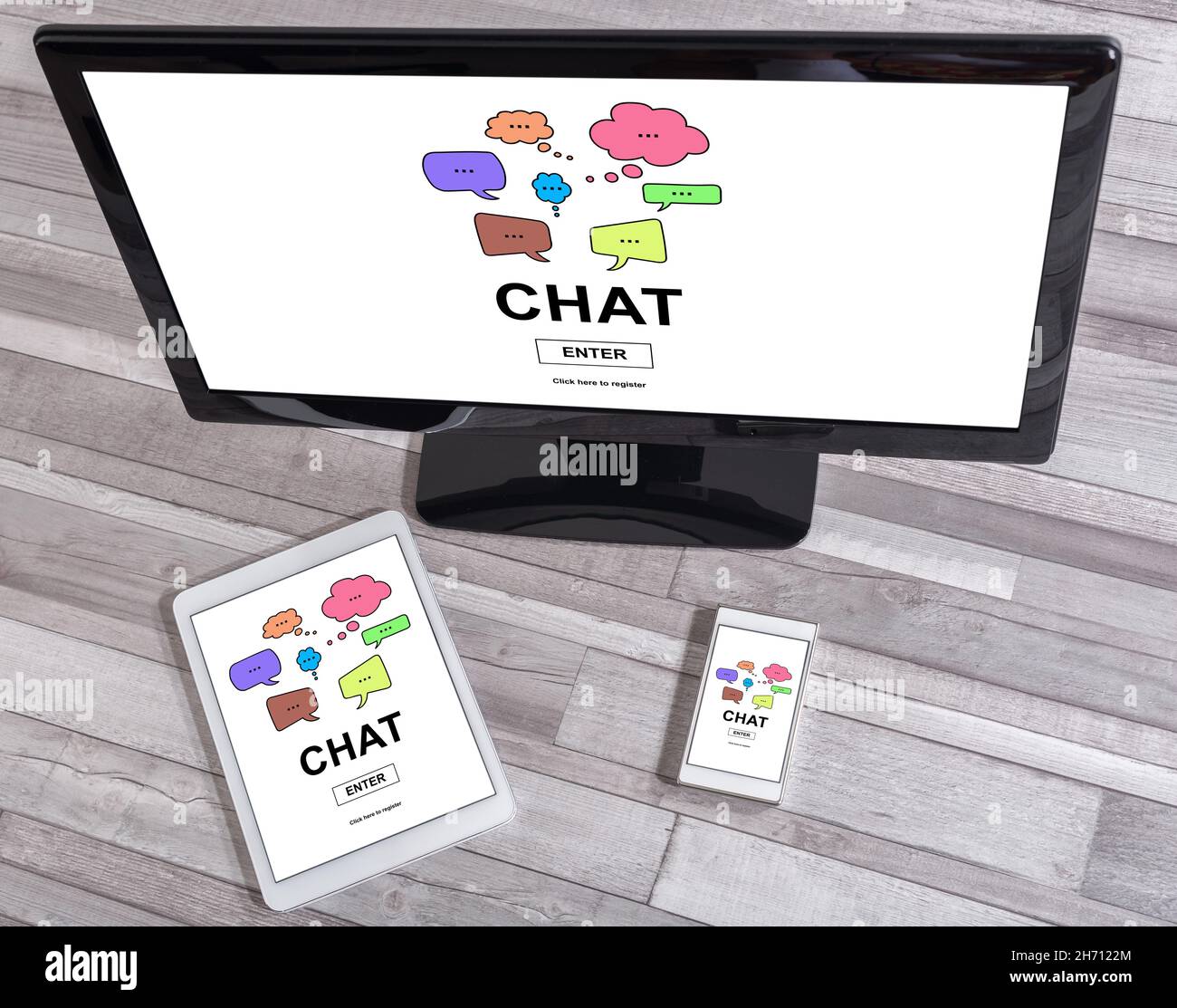 Chat concept shown on different information technology devices Stock Photo
