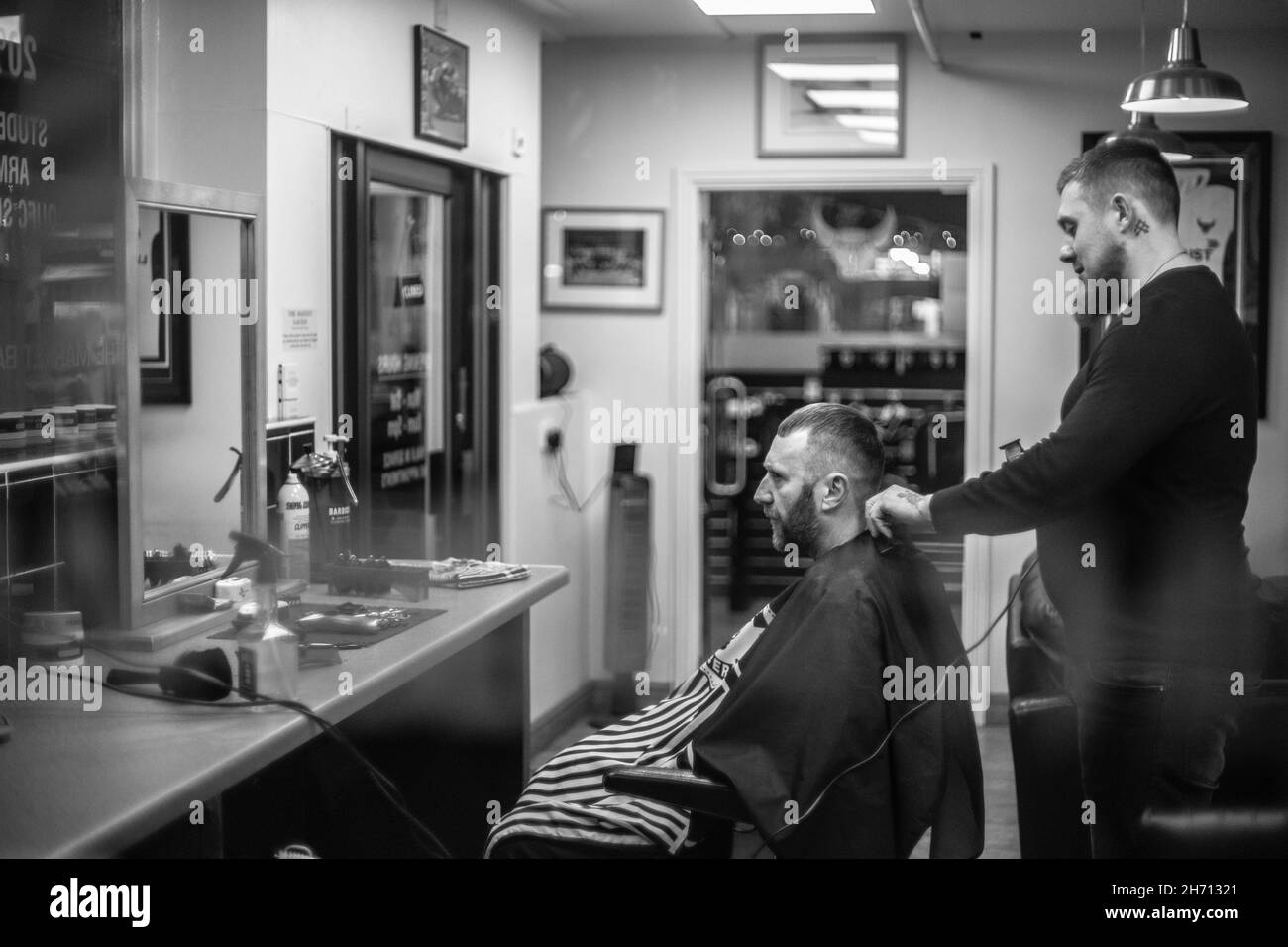 ZADAR, CROATIA Oct 14, 2021 A grayscale shot of a man getting a