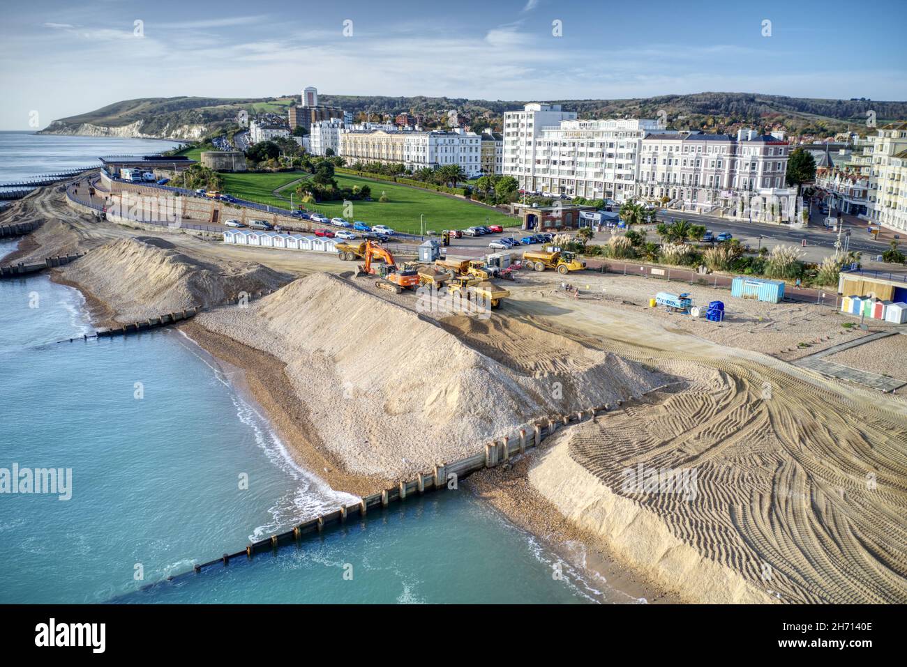 Aerial photo of Wish Tower and the Sea Defence works on Eastbourne Seafront with Diggers and