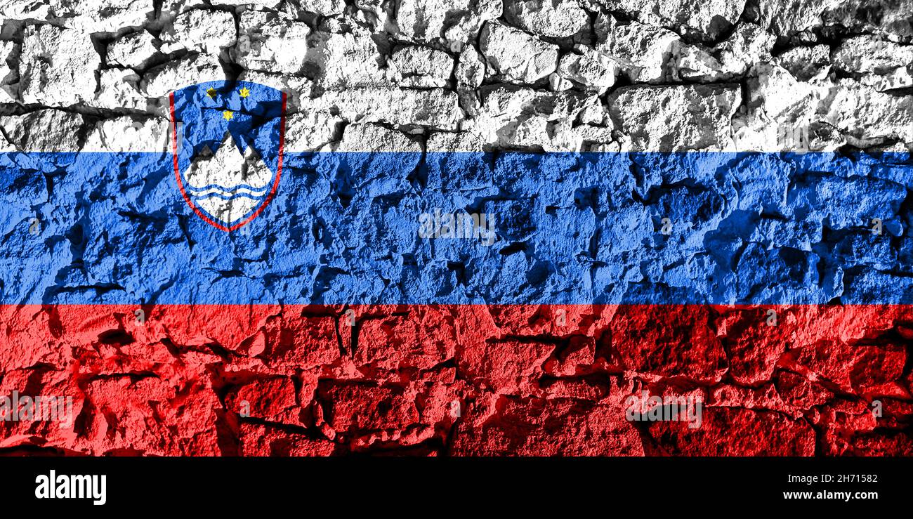 Slovenia flag depicted on a stone wall. The texture of the stone blends ...