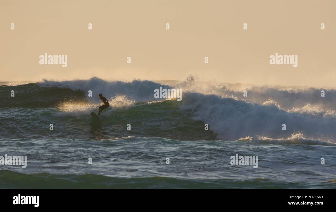 Surfing at Skaill Bay, Orkney Islands Stock Photo