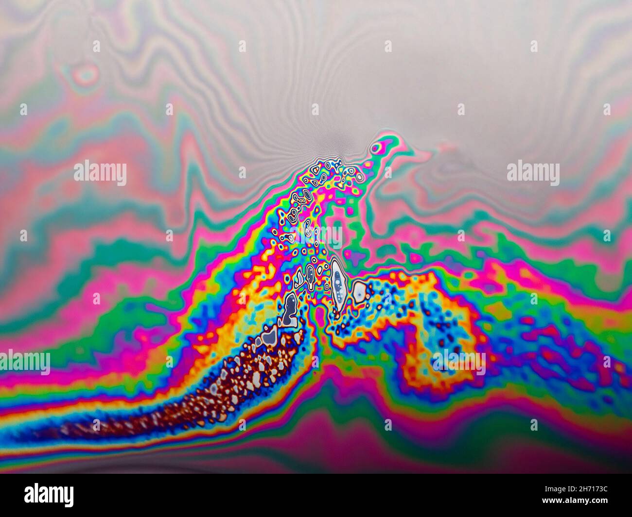 Abstract multicolor psychedelic background Closeup Soap bubble background Stock Photo