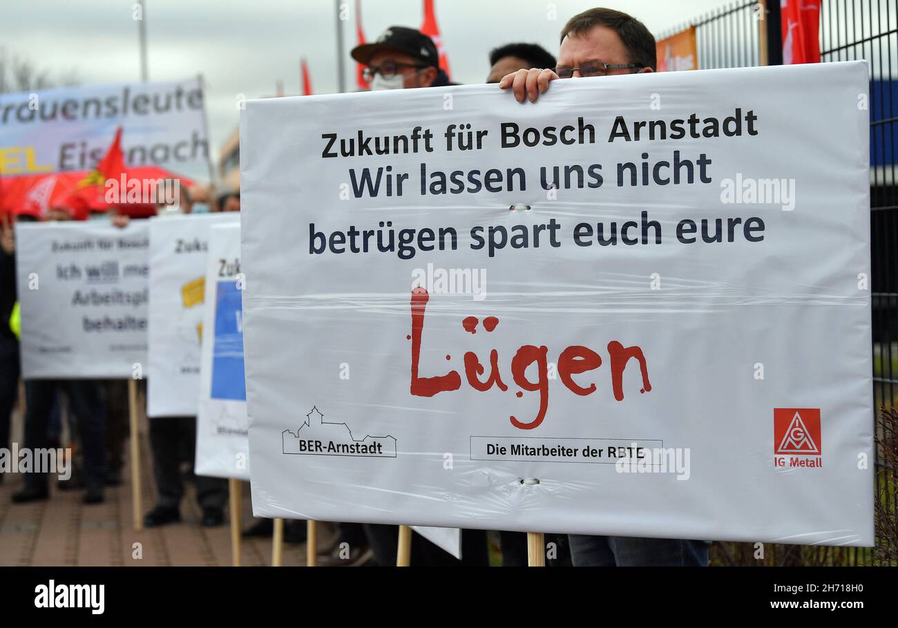Arnstadt, Germany. 19th Nov, 2021. Employees stand together at a rally  organized by IG Metall to save jobs at Bosch in Arnstadt. In July, Bosch  announced that it would close the Arnstadt