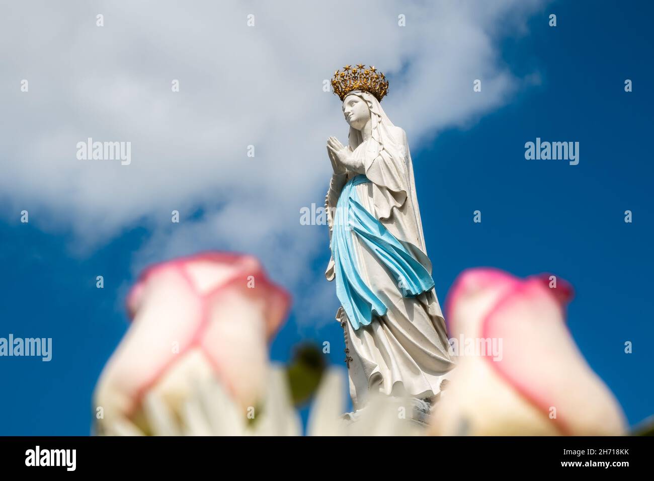 Lourdes, France - August 28, 2021: A statue of the holy Virgin Mary - our lady of Lourdes Stock Photo