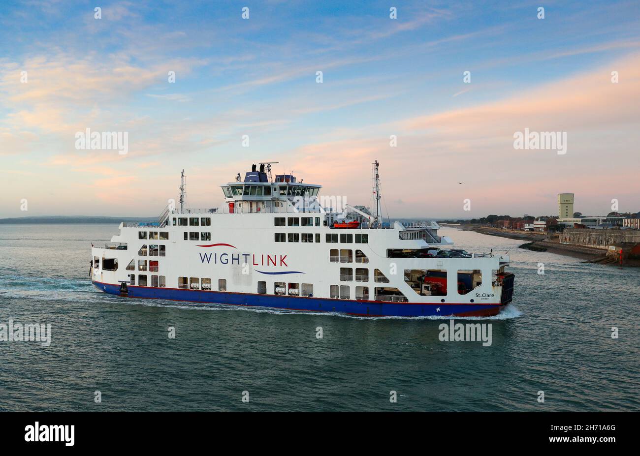 Wight Link Portsmouth to Isle of Wight Ferry St. Claire pictured sailing form Portsmouth at Sunrise Stock Photo