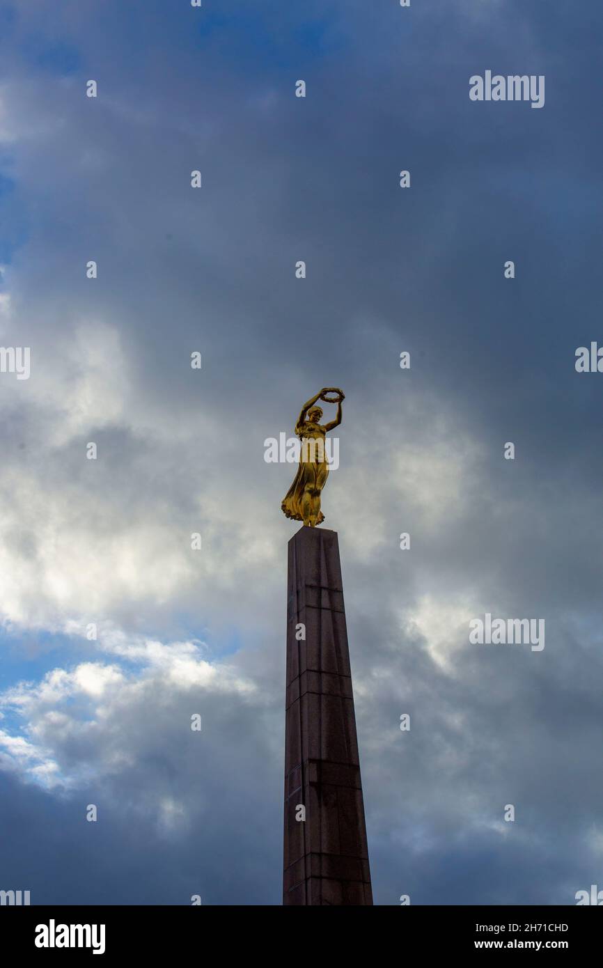 Monument of Remembrance near Constitution Square. It is a Granite obelisk & war memorial nicknamed 'Golden Lady' for its gilded statue. Luxembourg. Stock Photo