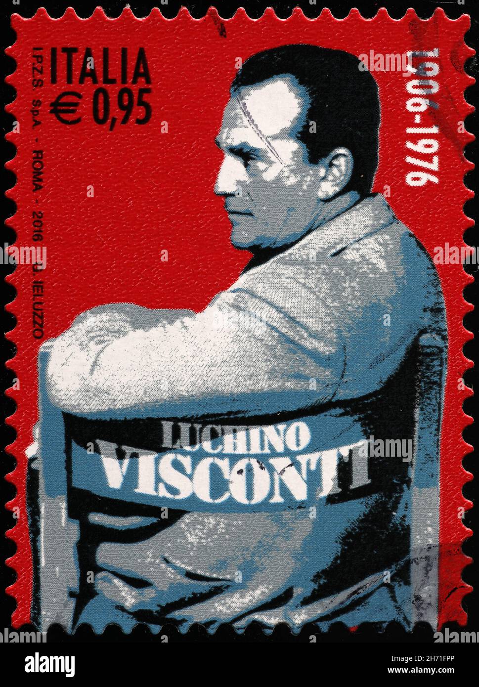 Famous film maker Luchino Viaconti on italian postage stamp Stock Photo