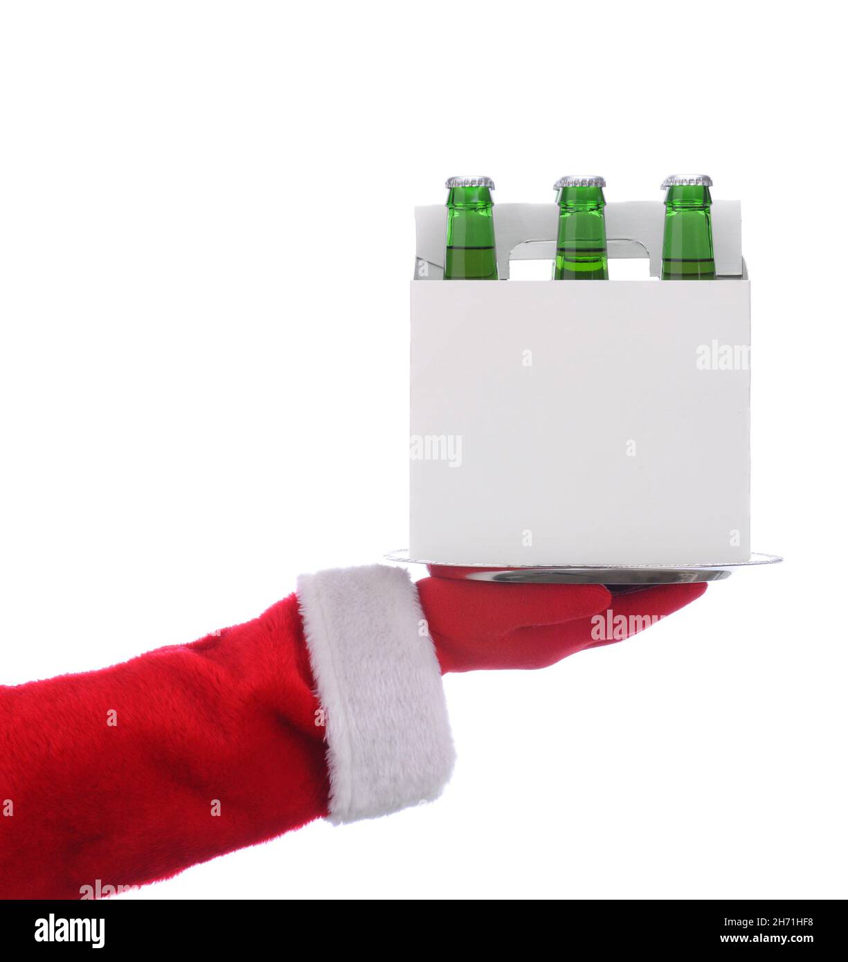 Santa Claus holding a serving tray with a 6 pack of beer over a white background, carrier is blank, no label, ready for your graphics or text. Stock Photo