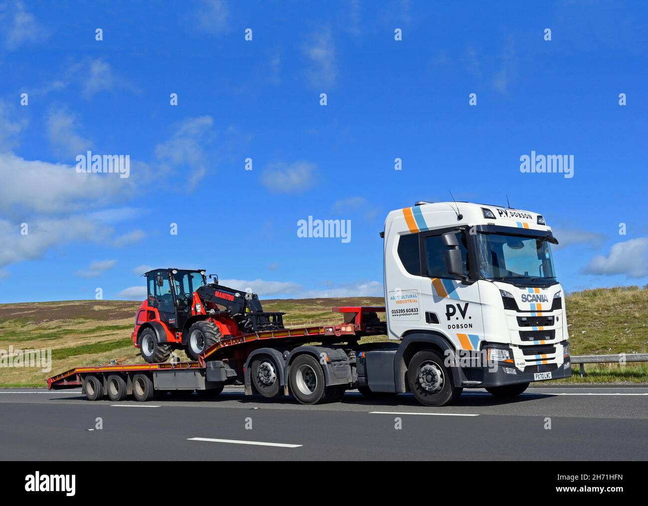 HGV with Manitou Articulated Loader. PV Dobson and Sons.  M6 Motorway, Southbound. Shap, Cumbria, England, United Kingdom, Europe. Stock Photo