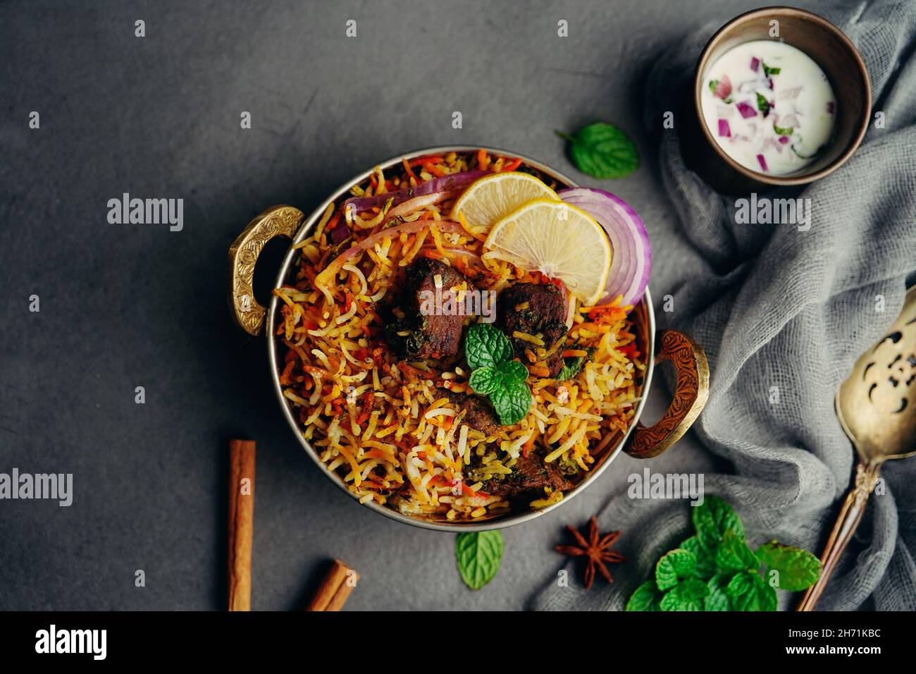 Homemade Mutton lamb biryani served with yogurt raita Stock Photo Alamy
