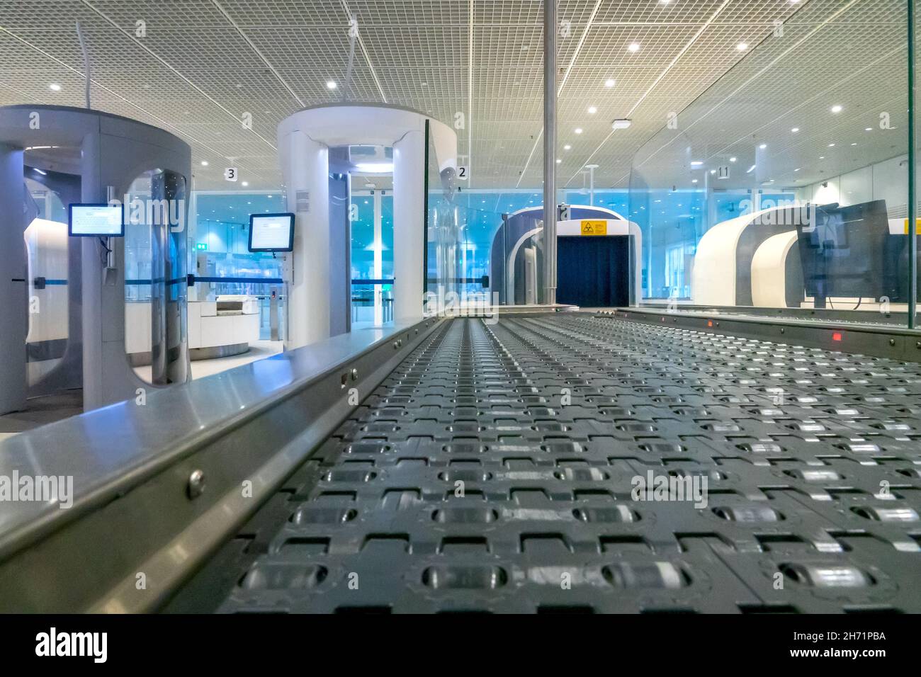 Airport security checkpoint with x-ray scanners for baggage and people. No people Stock Photo