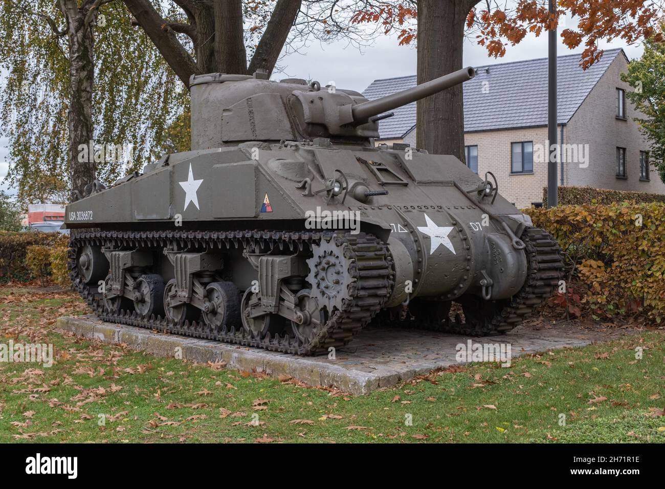 Mopertingen, Belgium - October 30, 2021: Tank memorial in Bilzen of the type M4A4 Sherman. Limburg Province. Autumn cloudy day. Selective focus Stock Photo