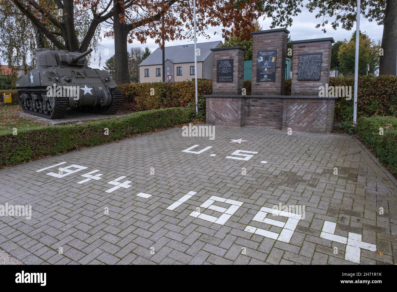 Mopertingen, Belgium - October 30, 2021: Tank memorial in Bilzen of the type M4A4 Sherman. Limburg Province. Autumn cloudy day. Selective focus Stock Photo