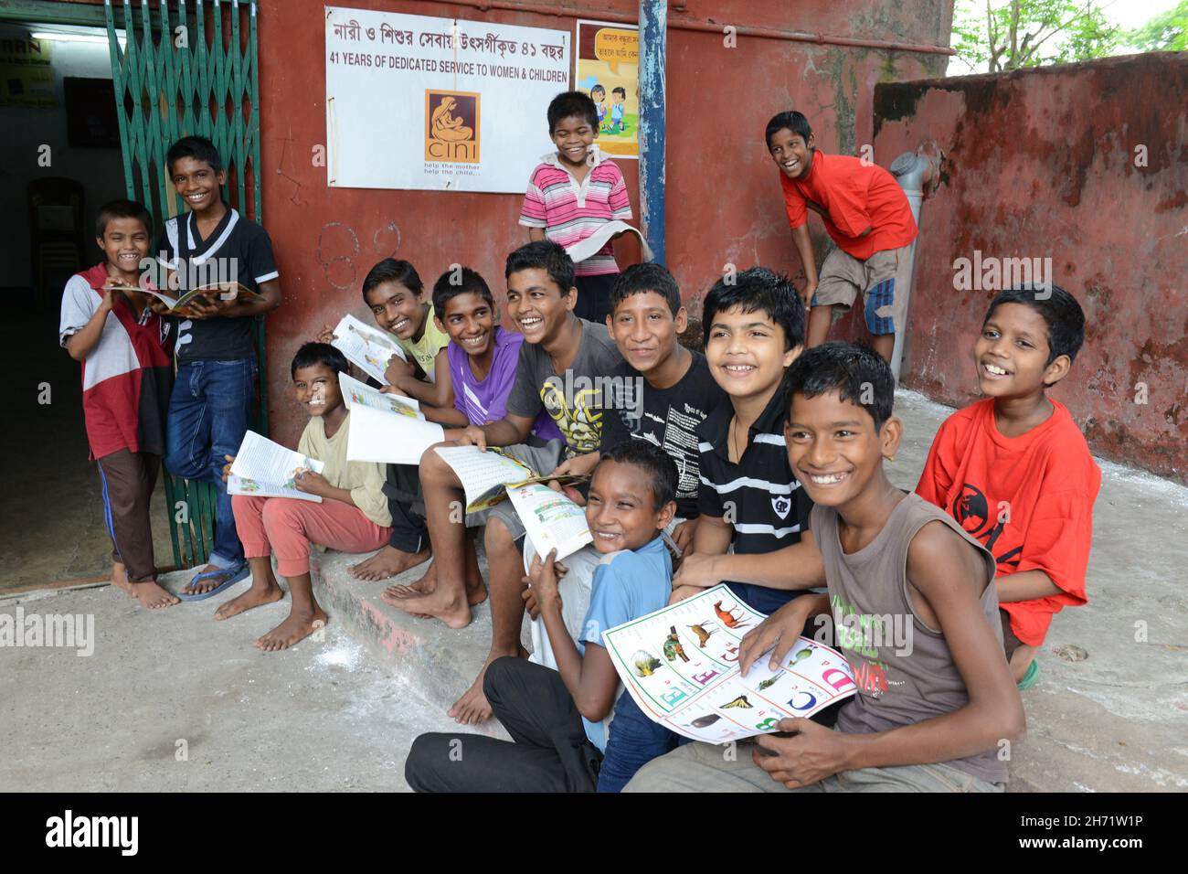 Classroom education, counselling support and first aid techniques provided to street kids. Kolkata, India. Stock Photo