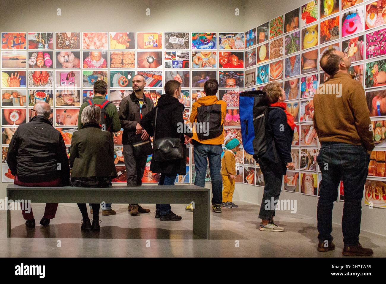 BRUSSELS, BELGIUM - Oct 16, 2021: A group of visitors at the Martin Parr exhibition in Brussels, Belgium, 17 September-18 December 2021 Stock Photo
