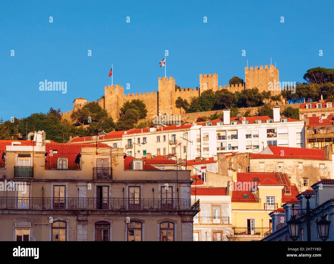 Lisbon, Portugal. Castelo de Sao Jorge seen from Praca da Figueira.  Castle of St George seen from the Figueira Square. Stock Photo